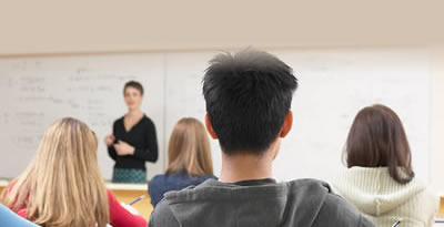 Image of an instructor in front of class